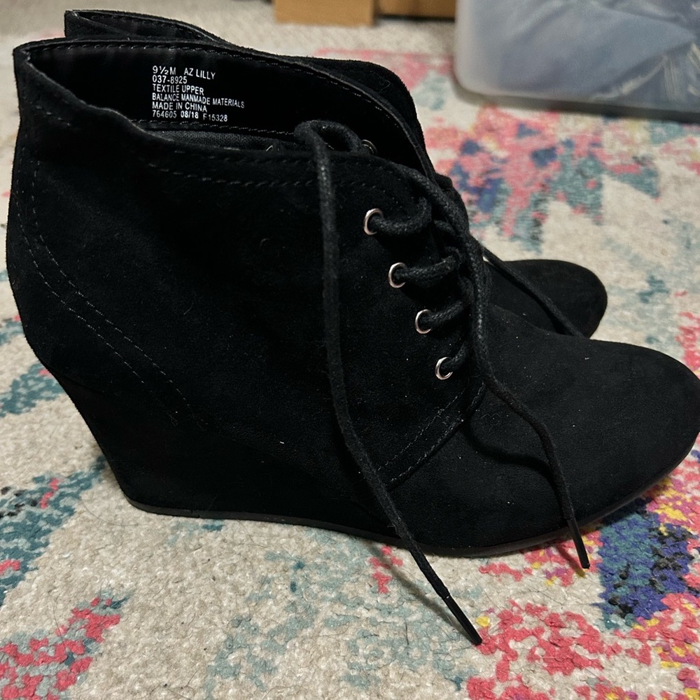 Black suede booties with wedges